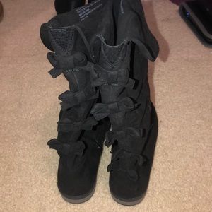 black shin high boots